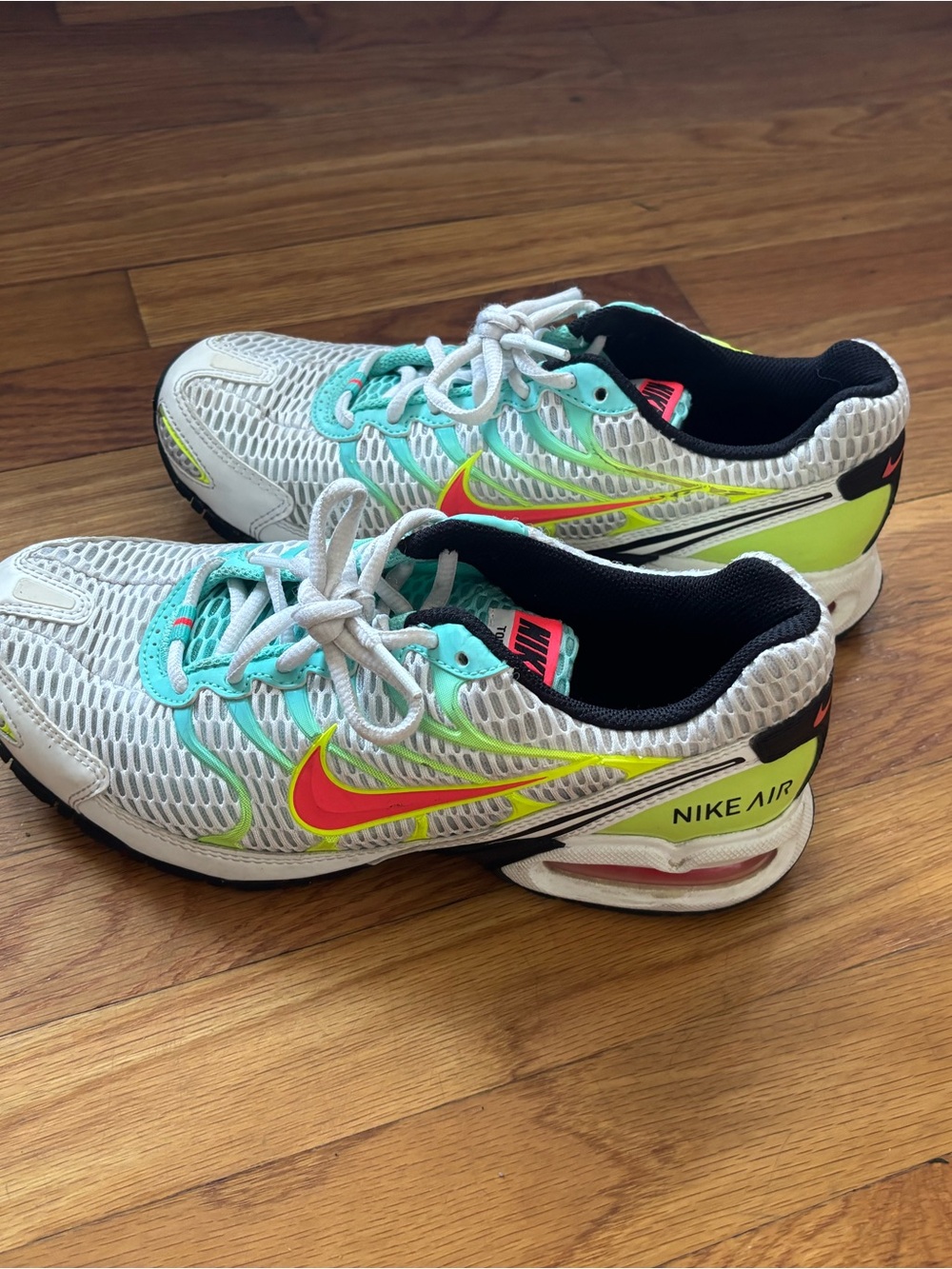 Nike Woman’s Air Max Torch 4 in White Volt Laser Crimson